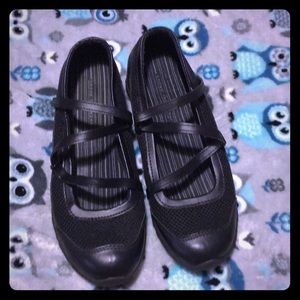 Black sandals with Velcro or you could say shoes